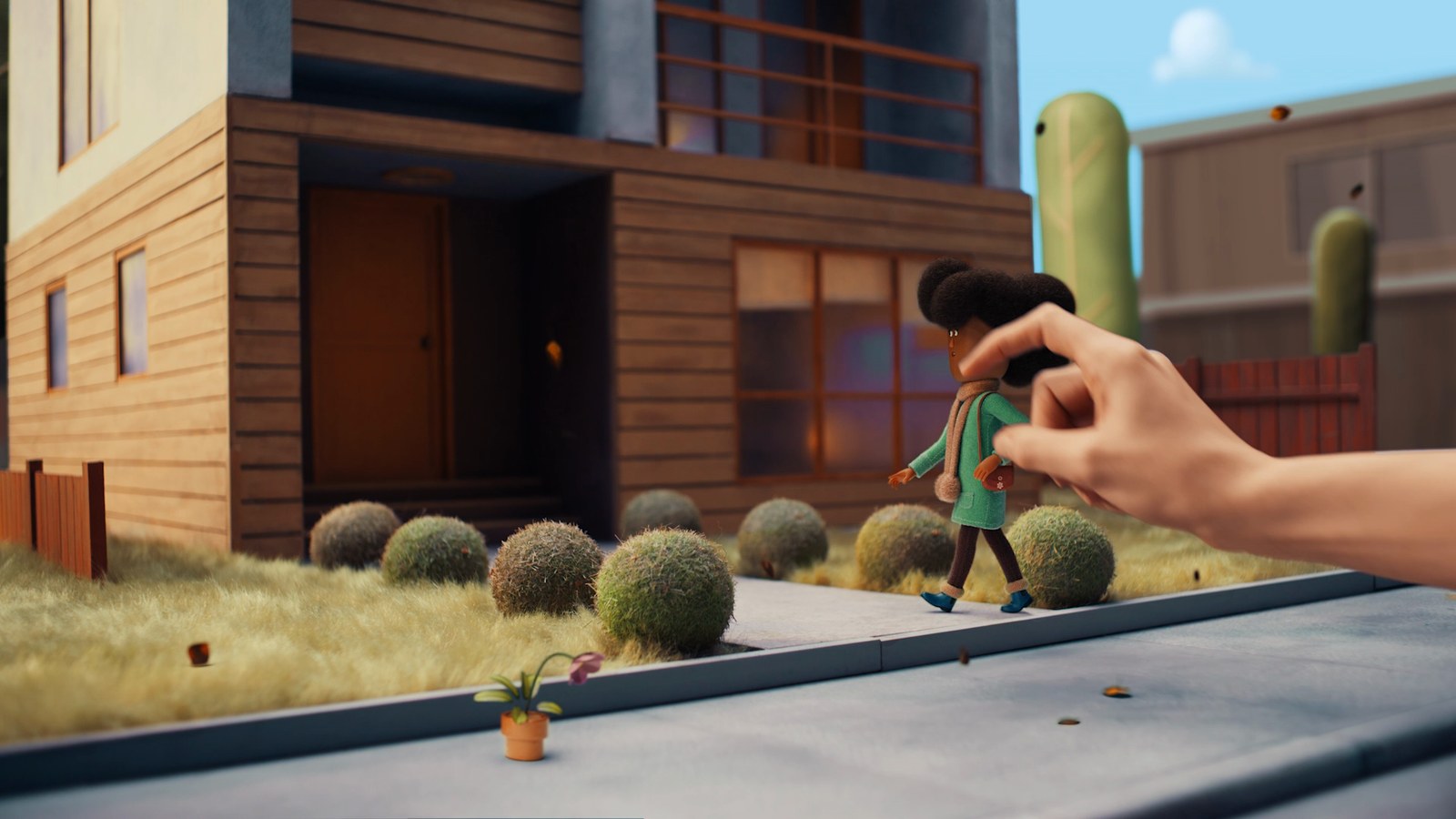 The Hand nudging a character on the pavement in the LG film