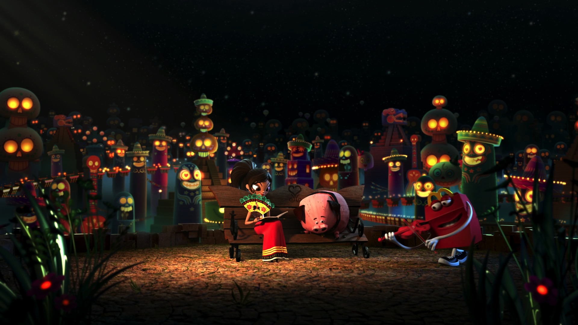 A village scene lit by lanterns at night