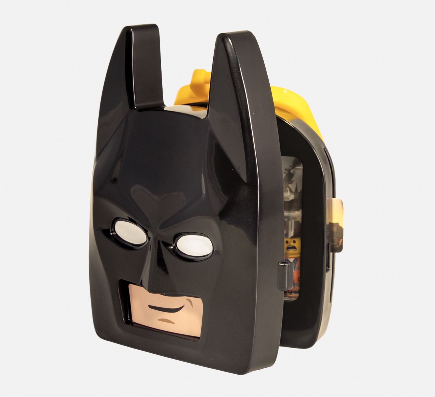 A LEGO Batman head toy in matte black plastic