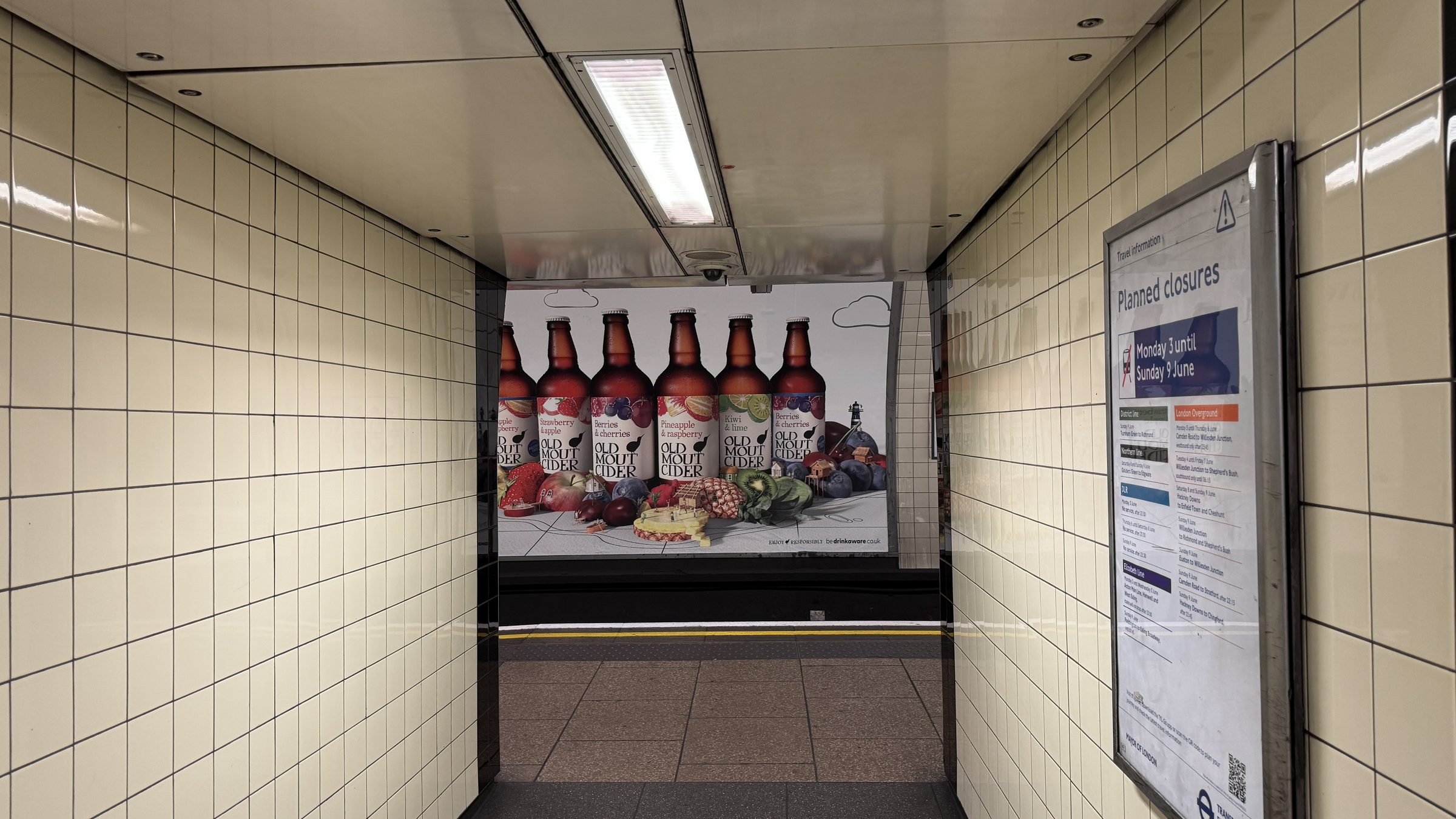 Moutopia board seen at the end of a tiled Underground passage
