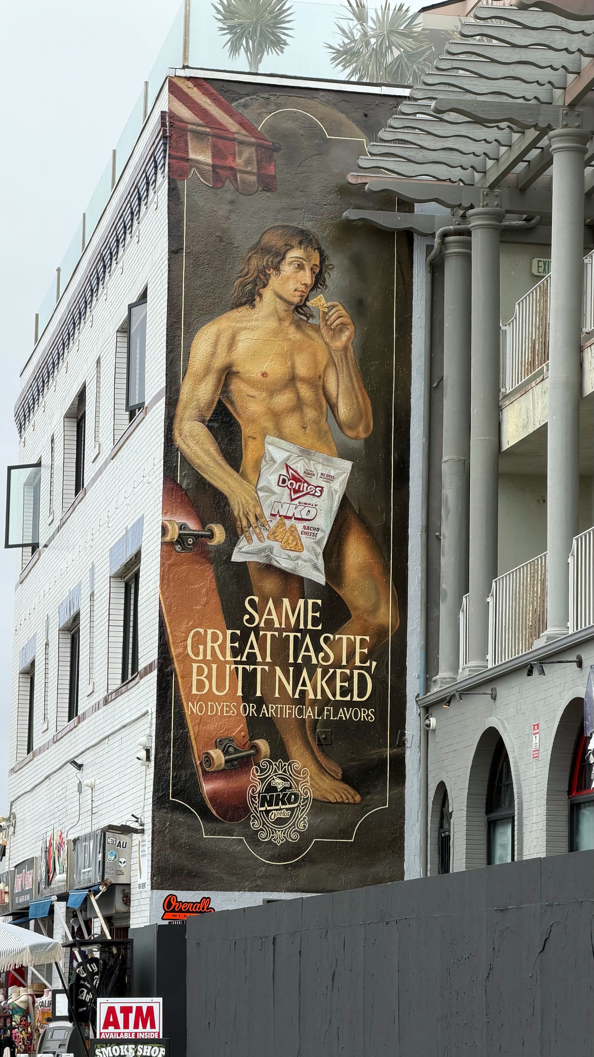 The Simply NKD mural painted on the side of a building in Venice Beach, Los Angeles